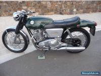 Norton 750 commando fastback, triumph bsa triton cafe racer