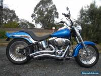 HARLEY DAVIDSON FLSTC  HEAPS OF CUSTOM PARTS LOOKS AND SOUNDS AWESOME