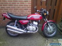 KAWASAKI 350cc S2 IN PEARL CANDY RED RECENT RESTORATION